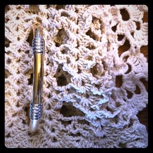 Gold and silver bracket